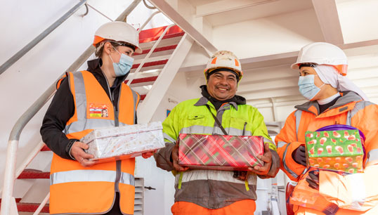 Christmas shoe in: Bryony Watson (left) Stella Maris regional port chaplain for Immingham, and Sr Kathleen Redido (right) on a visit from Stella Maris Rome, present some of the Christmas 'shoebox' gifts to a seafarer in Immingham. All images: Stella Maris
Image:Christmas shoe in: Bryony Watson (left) Stella Maris regional port chaplain for Immingham, and Sr Kathleen Redido (right) on a visit from Stella Maris Rome, present some of the Christmas 'shoebox' gifts to a seafarer in Immingham. All images: Stella Maris