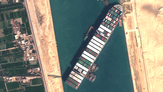 An image from space of the Ever Given stuck in the Suez Canal. Image: Sentinel Hub/Wikimedia Commons Image:An image from space of the Ever Given stuck in the Suez Canal. Image: Sentinel Hub/Wikimedia Commons