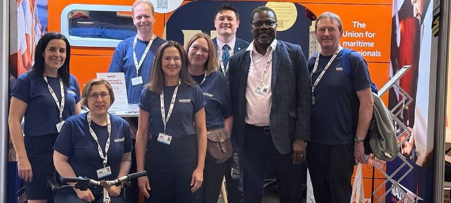 Nautilus International officials at the Union's 'ship's cabin' exhibition, stand 61, at the Brighton TUC Congress 2025. It showcased the urgent need to strengthen workplace protections for maritime professionals. Attendees were invited to see what it’s like to live and work onboard a deep sea vessel. Visitors could experience a real-life safety drill – by donning our immersion suit with the aim of quickly getting out of our cabin. Video screens also showcased our Nautilus TV YouTube channel. Image:Nautilus International officials at the Union's 'ship's cabin' exhibition, stand 61, at the Brighton TUC Congress 2025. It showcased the urgent need to strengthen workplace protections for maritime professionals. Attendees were invited to see what it’s like to live and work onboard a deep sea vessel. Visitors could experience a real-life safety drill – by donning our immersion suit with the aim of quickly getting out of our cabin. Video screens also showcased our Nautilus TV YouTube channel.