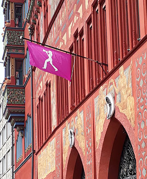 Image: A women's flag hangs on the Basel townhall during the Swiss women's strike on 14 June 2019