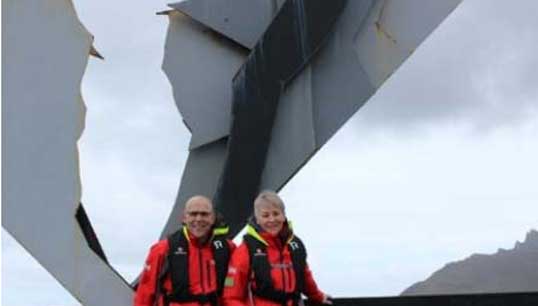 Well travelled: Gaynor and her husband Iain during their travels at Cape Horn in front of the Albatross Memorial for mariners lost in the Drake Passage, where the Atlantic and Pacific Oceans meet. Image:Well travelled: Gaynor and her husband Iain during their travels at Cape Horn in front of the Albatross Memorial for mariners lost in the Drake Passage, where the Atlantic and Pacific Oceans meet.