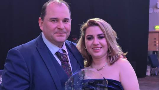 Grace_Holley_winner_National_Care_Home_Registered_Manager_of_the_year_with_Andrew_Jones_web.jpg