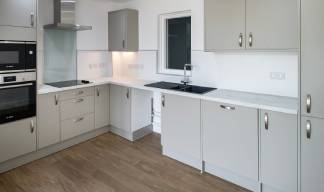Each apartment includes an emergency alarm system, an ensuite wet room, and accessible facilities in the kitchen (above). Image: Beccy Lane, Positive image Photography
Image:Each apartment includes an emergency alarm system, an ensuite wet room, and accessible facilities in the kitchen (above). Image: Beccy Lane, Positive image Photography